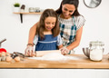 Shot of a mother and daughter having fun in the kitchen - PhotoDune Item for Sale