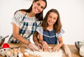 Shot of a mother and daughter having fun in the kitchen - PhotoDune Item for Sale