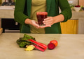 Woman holding a glass of red juice - PhotoDune Item for Sale