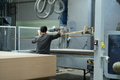 Industrial automation and robotics in modern industrial factory. Operator, worker using - PhotoDune Item for Sale