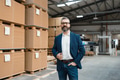 Production manager standing in modern industrial factory, controlling production process - PhotoDune Item for Sale