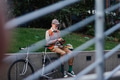 Stylish senior man sitting in the city park, holding tablet, shopping online. Concept of digital - PhotoDune Item for Sale