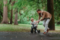 Single father with his little son spending together time in public park. - PhotoDune Item for Sale