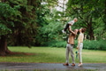 Young family with little son on walk after work. - PhotoDune Item for Sale