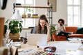 Young colleagues working in a photo atelier. - PhotoDune Item for Sale
