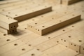 Close up of wooden parts in in big furniture manufacturing facility. Wooden parts for the production - PhotoDune Item for Sale