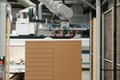 Close up of robotic arm in modern industrial factory, production of wooden furniture. Big furniture - PhotoDune Item for Sale