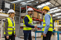 Engineers shaking hands with project manager in modern industrial factory, talking about new - PhotoDune Item for Sale