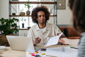 Young colleagues working together in photo atelier. - PhotoDune Item for Sale