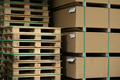 Close up of wooden parts and stacked eur palllet in in big furniture manufacturing facility. Wooden - PhotoDune Item for Sale