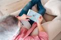 Man using smart thermostat, adjusting, lowering heating temperature at home. Concept of sustainable - PhotoDune Item for Sale