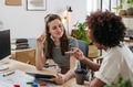 Young colleagues working together in startup company. - PhotoDune Item for Sale