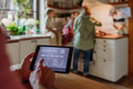 Man using smart thermostat, adjusting, lowering heating temperature at home. Concept of sustainable - PhotoDune Item for Sale