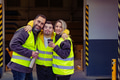 Man with Down syndrome and his colleagues taking break from work, drinking coffee, hot tea outdoors - PhotoDune Item for Sale