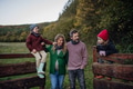 Portrait of family outdoors going on walk in nature. Mother, father and kids spending time outdoors - PhotoDune Item for Sale