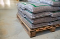 Bags with wood pellets, pellet fuels manufactured in wood pellet line. Reusing wooden industrial - PhotoDune Item for Sale