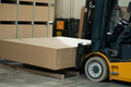 Close up of forklift working in warehouse. Industrial lift truck, jitney lifting and moving - PhotoDune Item for Sale