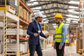 Supervisor, manager scolding employee in modern industry factory. Worker making mistake. Production - PhotoDune Item for Sale