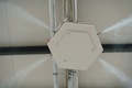 Industrial dust control system in modern manufacturing factory. Dust suppression with water mist - PhotoDune Item for Sale