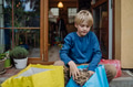 Boy kitchen waste, peel and leftover vegetables scraps into kitchen compostable waste. Boy sorting - PhotoDune Item for Sale