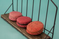 Set of colorful macarons in blue turquoise pastel isolated background on wood table - PhotoDune Item for Sale
