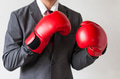 Businessman in boxing gloves on white background - PhotoDune Item for Sale