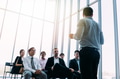 Man talking to coworkers in conference hall - PhotoDune Item for Sale