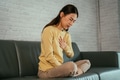 Young female suffering from heartburn - PhotoDune Item for Sale