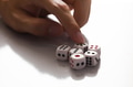 Human hand ready to roll the dice - PhotoDune Item for Sale