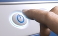 Finger pressing a power button to start an electronic device. - PhotoDune Item for Sale