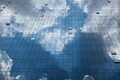 Abstract glass building reflecting clouds and blue sky - PhotoDune Item for Sale