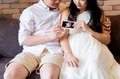 Couple with ultrasound picture of baby - PhotoDune Item for Sale