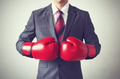 Businessman in boxing gloves on white background - PhotoDune Item for Sale