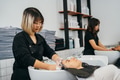 Hairdresser shampooing hair of female customer - PhotoDune Item for Sale