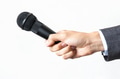 Man in business suit holding a microphone - PhotoDune Item for Sale