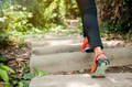 Young athletic woman running on forest trail - PhotoDune Item for Sale