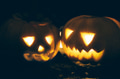 Close-up of Spooky and laughing carved Halloween Jack-o-lantern pumpkins - PhotoDune Item for Sale