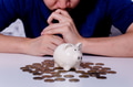 Young Asian man considering and thinking of saving money and investment - PhotoDune Item for Sale
