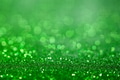 Green glitter surface with green light bokeh background - PhotoDune Item for Sale