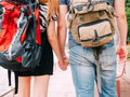 Couple travelers walking and holding hands together - PhotoDune Item for Sale