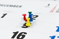 Pushpins on calendar, Busy and overworking days. Important date or meeting appointment reminder - PhotoDune Item for Sale