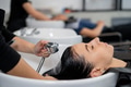 Hairdresser washing hair of customer - PhotoDune Item for Sale