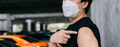 Young man showing arms with bandage after Covid-19 vaccine injection - PhotoDune Item for Sale