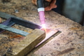 arc welding steel on a stone table - PhotoDune Item for Sale