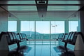 Modern airport departure lounge with plane taking off - PhotoDune Item for Sale