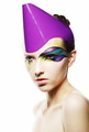 Studio portrait of young woman with colorful make up - PhotoDune Item for Sale