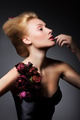 Young adult woman wearing strapless dress with roses - PhotoDune Item for Sale
