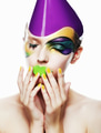 Studio portrait of young woman with colorful make up - PhotoDune Item for Sale