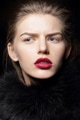 Studio portrait of beautiful woman wearing red lipstick - PhotoDune Item for Sale