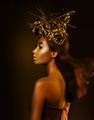 Fantasy. Enigmatic woman covered in gold color - PhotoDune Item for Sale